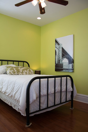 bedroom in a modern home with a bedの写真素材