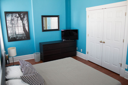 bedroom in a modern home with a bedの写真素材