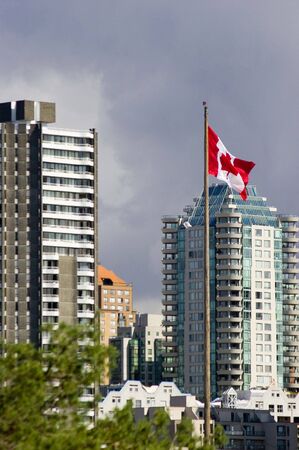 Canadian flag and buildingsの写真素材