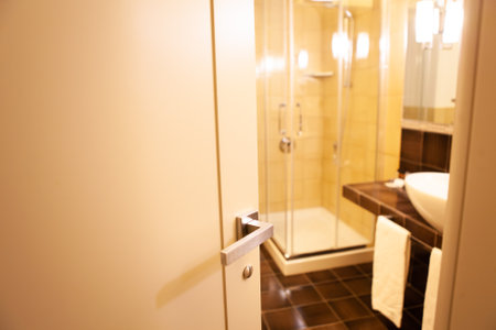 Modern shower with glass cabin inside bathroom interiorの写真素材