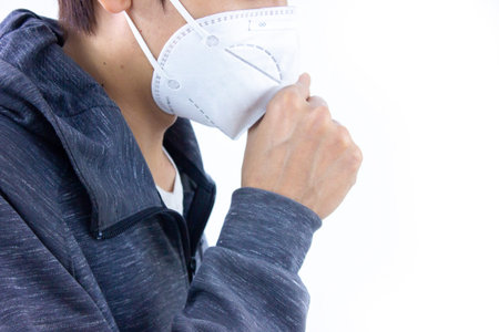 Woman wearing a mask to prevent the spread of COVID-19
