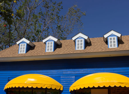 yellow awning and blue window shop