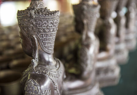 side of bronze buddha statueの写真素材
