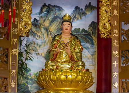 The goddess of compassion and mercy statue on gold lotusのeditorial素材