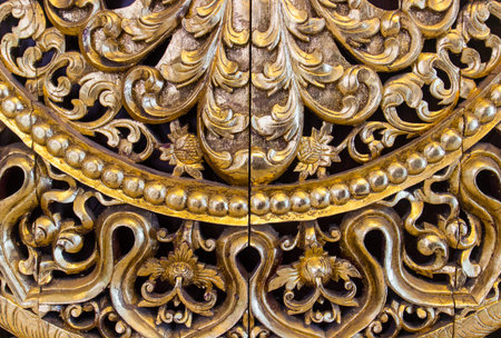 the art of handmade gold sculpture tracery for decorationの写真素材