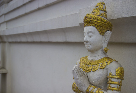 the art of asian angel paying respect statuaryの写真素材