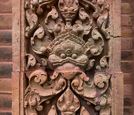 the asian carved art style on the wall