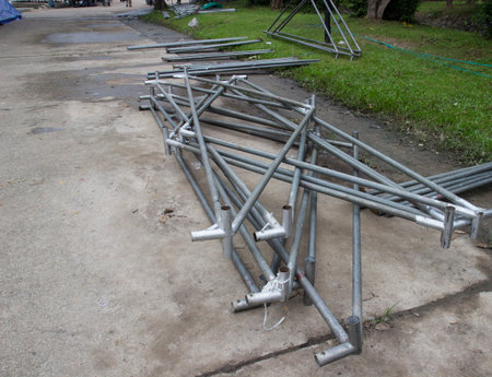the tent pole on the ground for installing