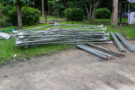 the tent pole on the ground for installing