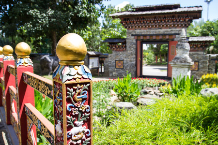 the bhutan colorful carving art on the wooden bridgeの写真素材