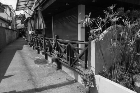 the terrace of the shop in the alley in asian cityの写真素材