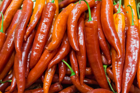 the stack of red chili for backgroundの写真素材
