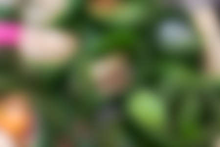 the blurry image of green,white,black ,yellow and pink color tone abstract for backgroundの写真素材