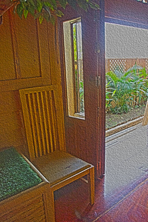 oil paint effect on the image of the wooden chair beside the door near the gardenの写真素材