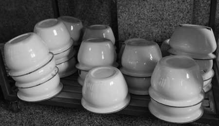 a lot of old design spittoon on the cabinetの写真素材