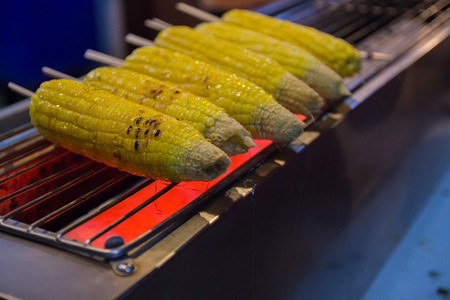 corn roasting on the stove for sellingの写真素材