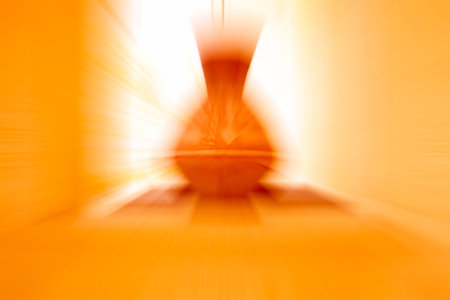 orange,brown color tone radial motion blur illustration abstract for backgroundの写真素材