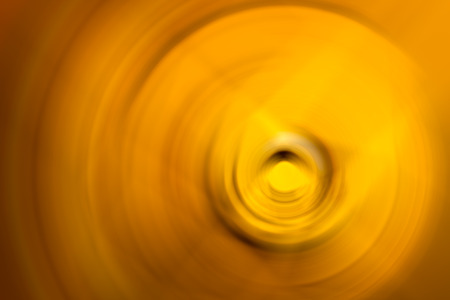 yellow color tone radial motion blur illustration abstract for backgroundの写真素材