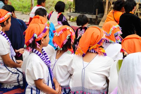 Chiangmai, Thailand - December 18, 2014: thailand hill tribe girl with traditional northern tribe costume in royal project fair at Chiangmai university.のeditorial素材