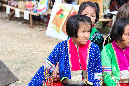 Chiangmai, Thailand - December 18, 2014: thailand hill tribe girl with traditional northern tribe costume in royal project fair at Chiangmai university.のeditorial素材