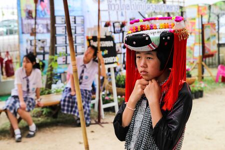 Chiangmai, Thailand - December 18, 2014: thailand hill tribe girl with traditional northern tribe costume in royal project fair at Chiangmai university.のeditorial素材