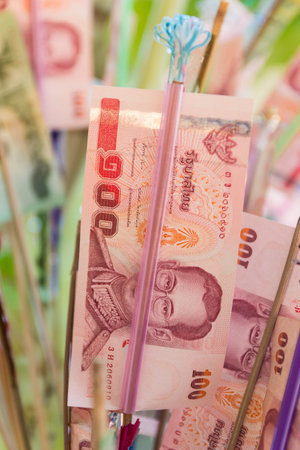 thailand hundred baht banknote that buddhist people donate to the temple
