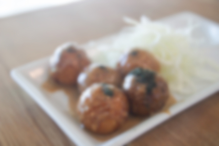 blurry defocused image of japanese squid batter ball for backgroundの写真素材