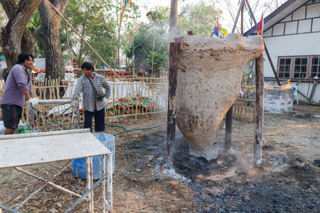 Chiangmai, Thailand - February 22, 2015: The workers are waiting to mold buddha statue in Sridonmoon temple.のeditorial素材