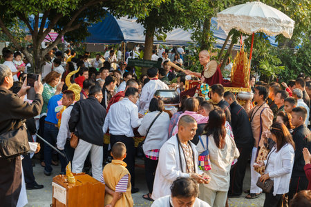 Chiangmai, Thailand - February 22, 2015: buddhism monk is blessing people after he spend 3 days in...