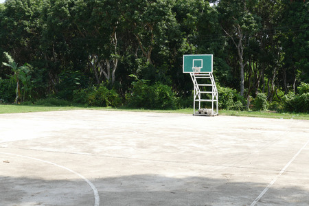 Basketball hoop in outdoor court in the parkの写真素材