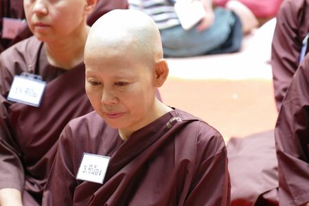 Phatthalung, Thailand - July 30, 2015: The buddhist nun ordination ceremony in Santibunpot temple.のeditorial素材