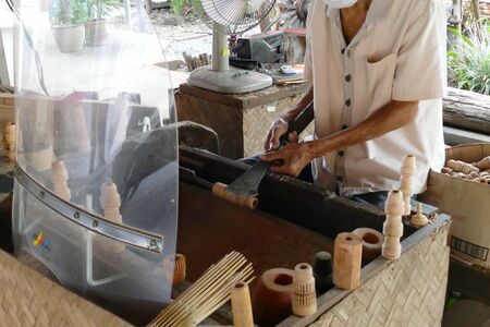 Chiang Mai, Thailand, September 30, 2015: The artisan is making thailand traditional paper umbrellaのeditorial素材