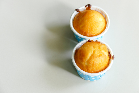 small lemon cup cake in blue cupの写真素材
