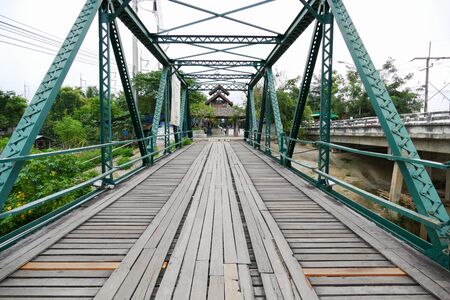 Mae Hong Son, Thailand - November 21, 2015. Tourist walking at history bridge at Mae Hong Son, Thailand on November 2, 2015.のeditorial素材