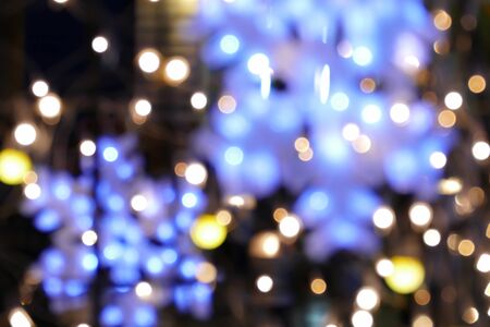 abstract bokeh light for christmas holiday backgroundの写真素材