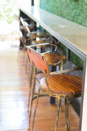 wooden bar stool in coffee shopの写真素材