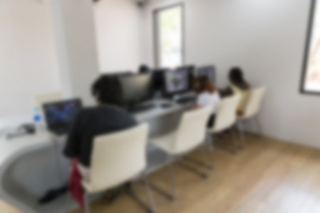 student use computer to access to internet for education in university