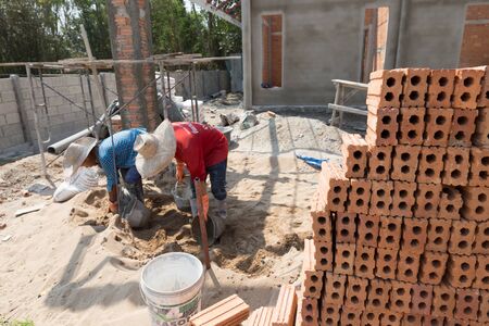 Chiang Mai, Thailand - March 9, 2016: worker build house at construction site at Hangdong district in Chiang Mai, Thailand on March 9, 2016.のeditorial素材