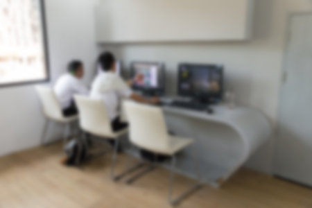 student use computer to access to internet for education in university