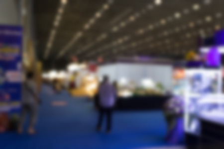 blur background of people shopping in fair tradeshow which retailer selling various productの写真素材