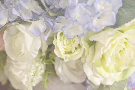 bouquet of artificial rose flower for decoration (vintage tone, soft and selective focus)