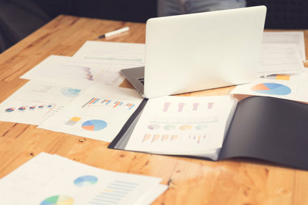 business document and laptop computer notebook for working concept, selective focus and vintage toneの写真素材