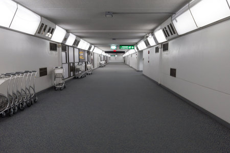 interior corridor in airport terminal buildingの写真素材