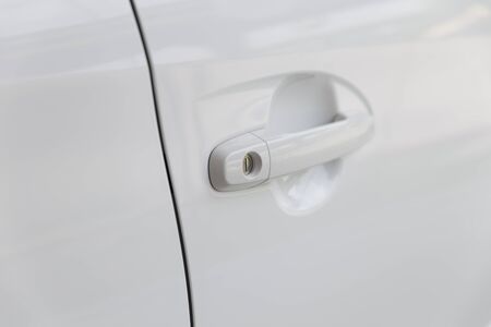 door handle of new white carの写真素材