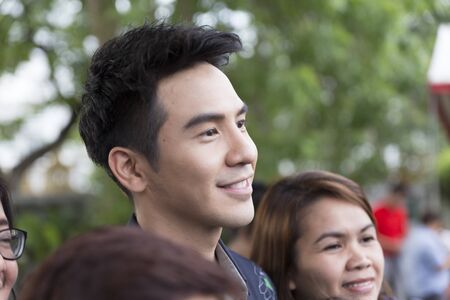 Chiang Mai, Thailand - May 21, 2016: Thanawat Wattanaputi or Pope, famous Thai actor, taking photo with his fan club at Toyota street fun festival in Chiang Mai, Thailand on May 21, 2016.のeditorial素材
