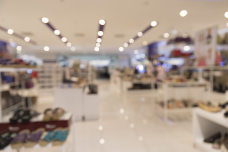 shoes selling in department store for use as shopping concept, blur backgroundの写真素材