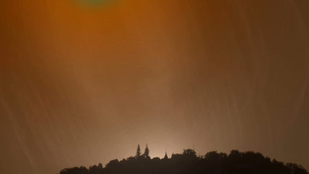 view of asian buddhist pagoda on mountain during sunset