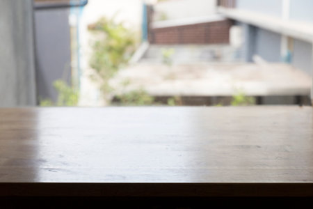 wooden table beside window for montage or display your product