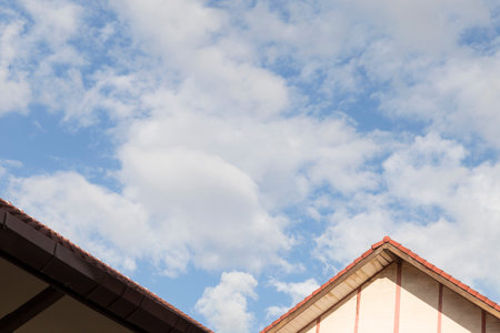 roof of old vintage wood building and blue sky