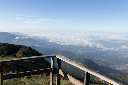 wood balcony terrace with mountain view in morningの写真素材